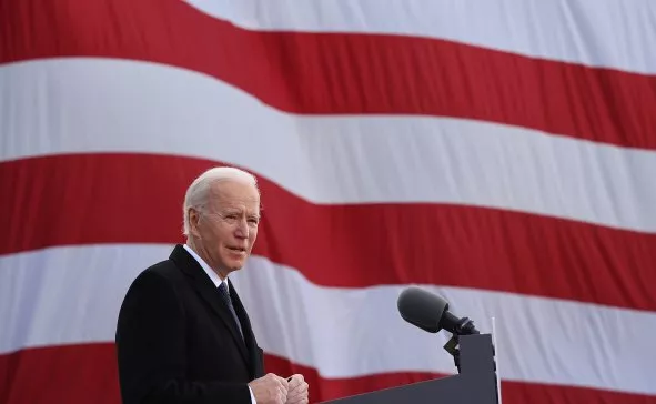 Biden speaks in front of people