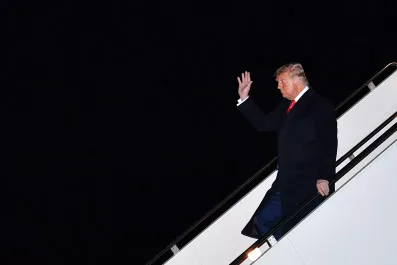 Image of trump steps off air force